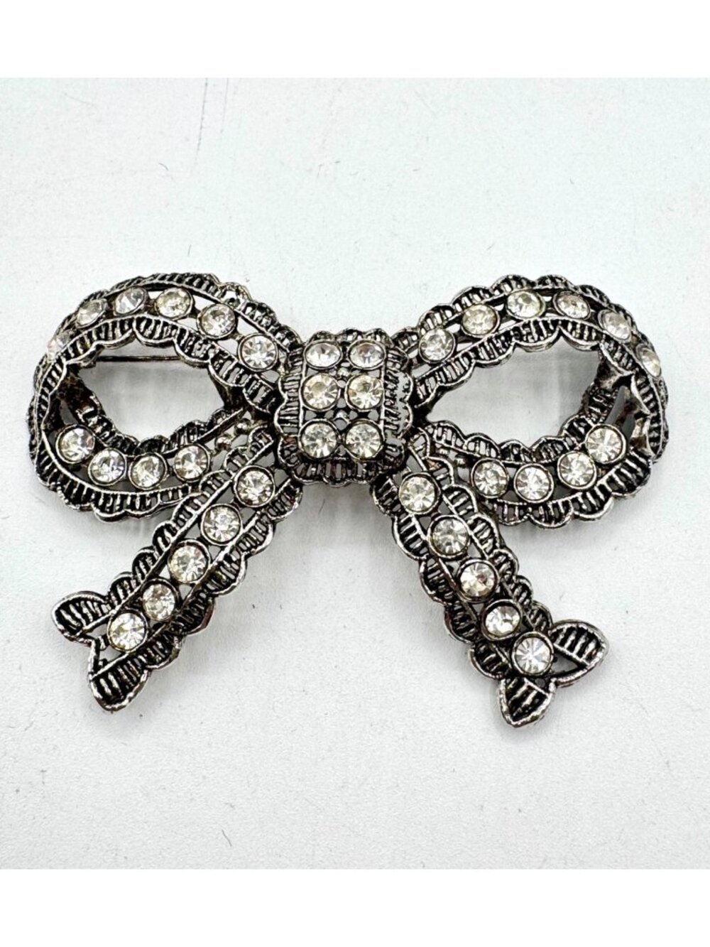 Vintage Large Bow With Rhinestones On A Silver Tone Brooch